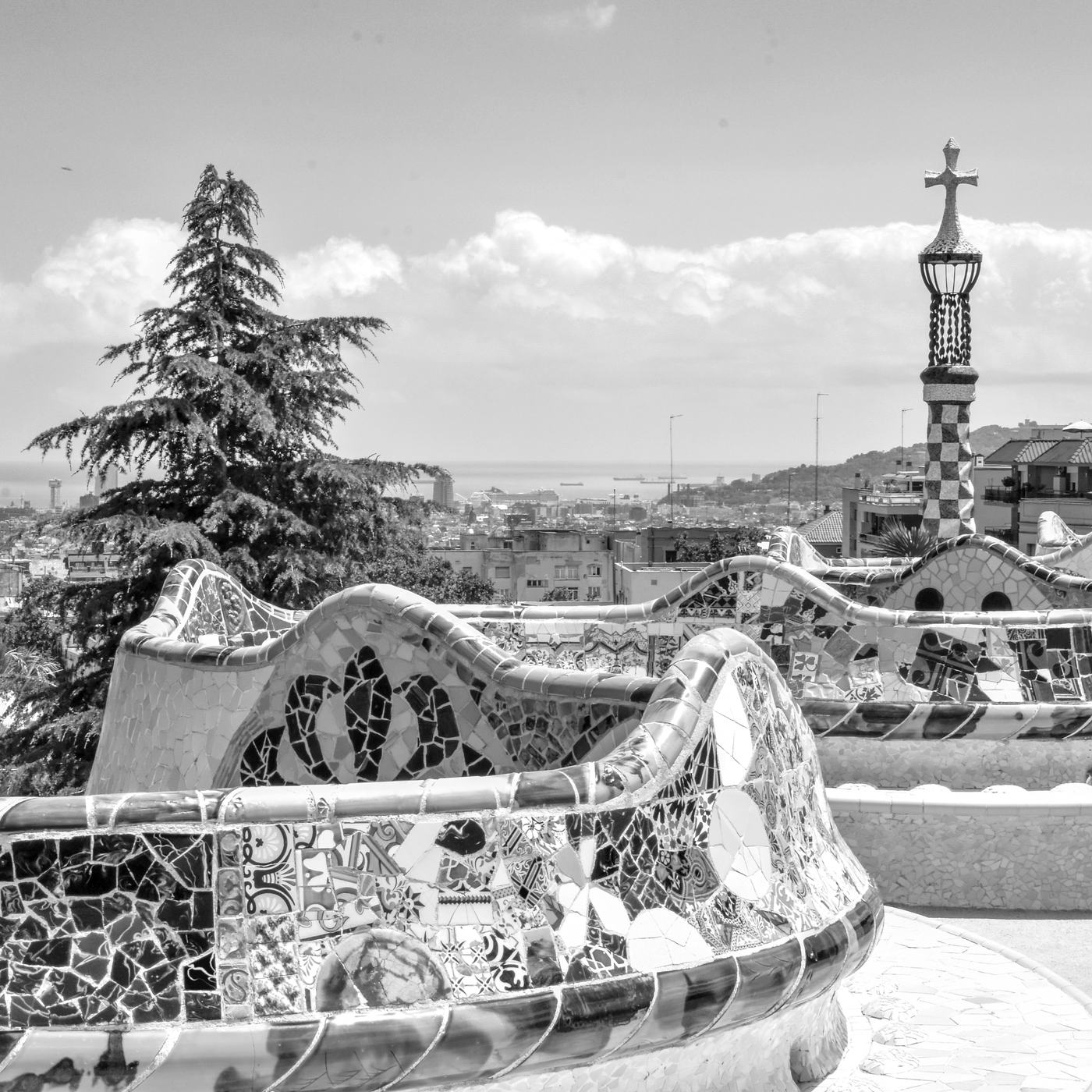 The mosaic bench at Park Güell, looking out over the city to the sea
